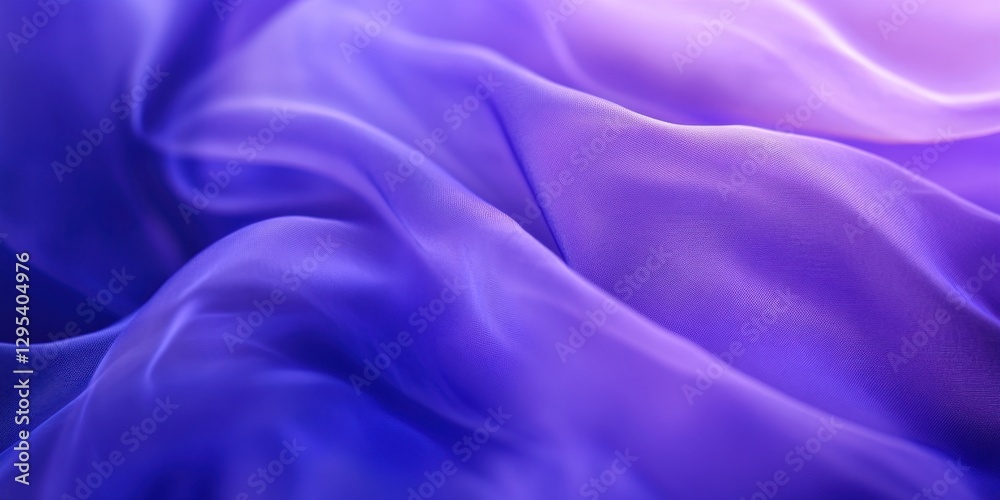 Obraz premium Fluid Dreams: Abstract view of draped fabric, a symphony of soft folds in a vibrant purple and blue, that captures a sense of ethereal beauty and flowing motion