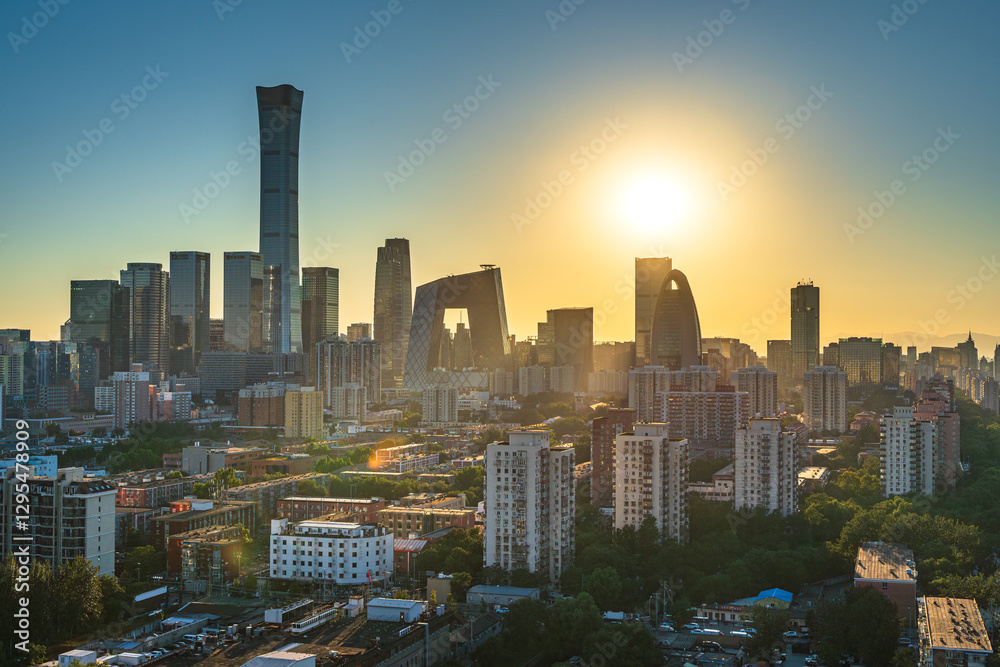 Fototapeta premium In the early morning in Beijing, China, urban landmarks under the rising sun
