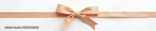 Simple wooden bow tied with ribbon on white background, decorative items, textiles