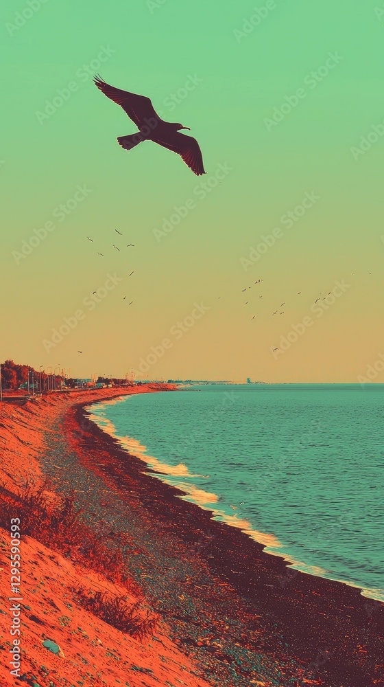 Naklejka premium Coastal birds flying over beach