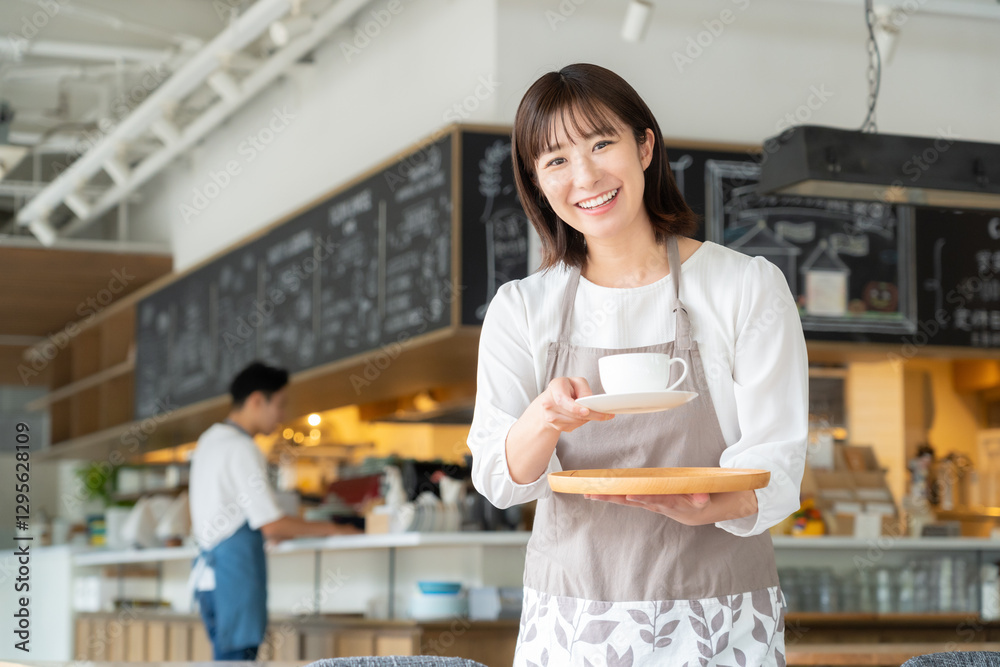 Fototapeta premium カフェで働く女性店員