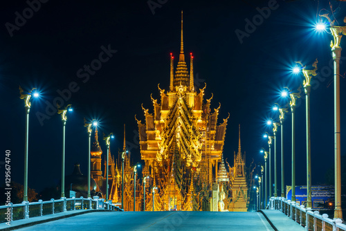 Obraz na płótnie PHITSANULOK, THAILAND - February 11,2025:Turn on lights at night. beautiful Temple (Thai language:Wat Chan West) is a Buddhist temple (Thai language:Wat) It is a major tourist attraction Phitsanulok w salonie