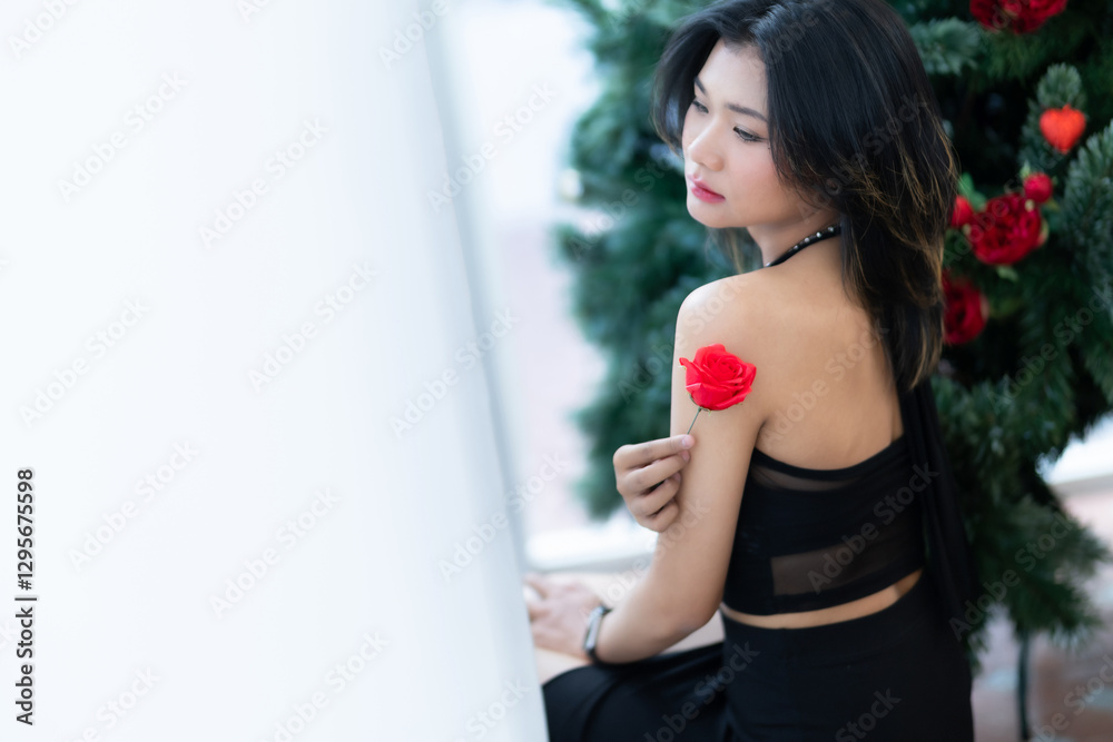 valentine's day, Portrait beautiful asian people woman fashion model in summer Black dress and coffee in cup holding bouquet of red roses in the living room inside or cafe