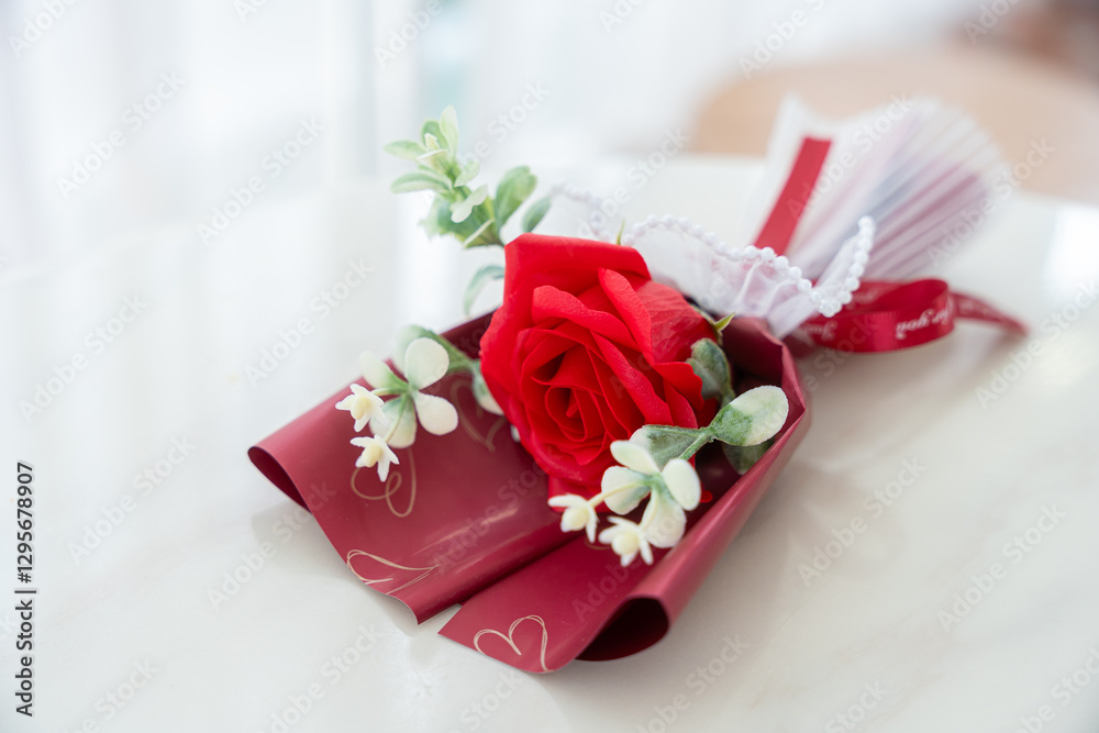 Valentine's day concept, bouquet of red and pink roses Put on the table food lunch In a restaurant background