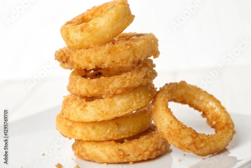 onion ring stacked in a tower on white photo