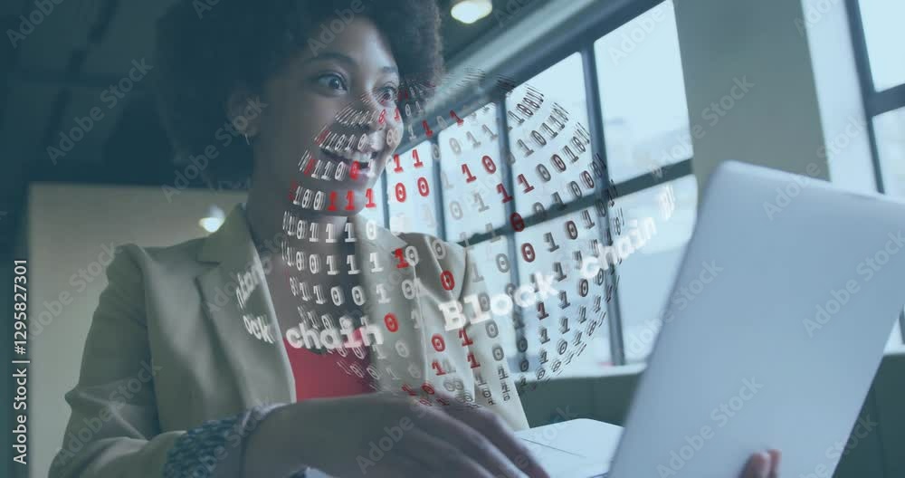 Businesswoman working on laptop with blockchain data animation over her