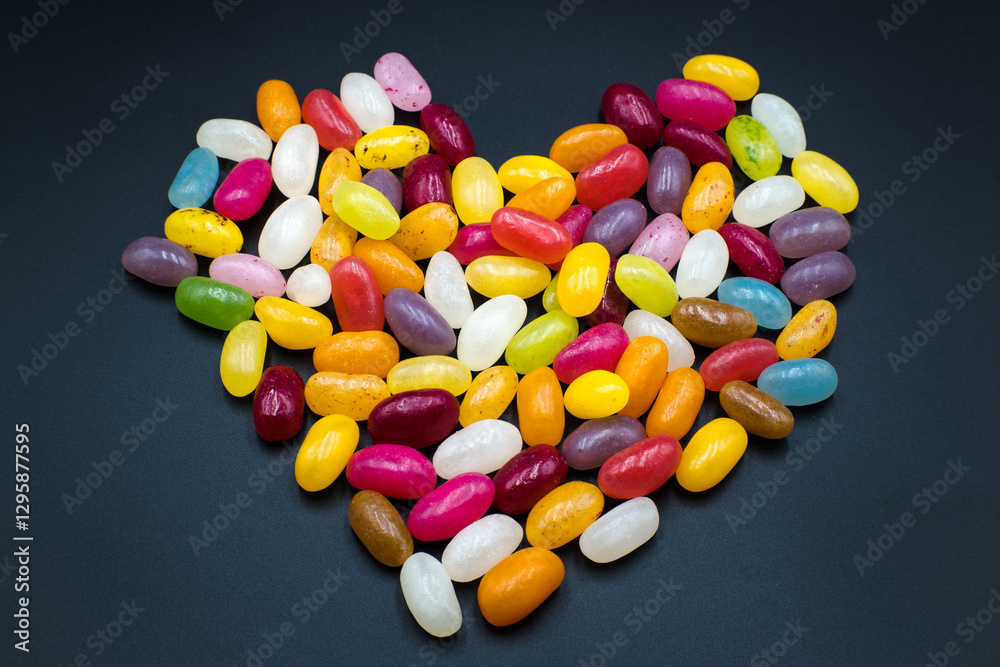 Jelly beans, colorful sweet heart-shaped candies.
