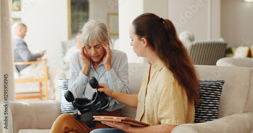 Tableau sur toile Senior woman, headache and virtual reality on couch with tablet for test, metaverse and caregiver in retirement home