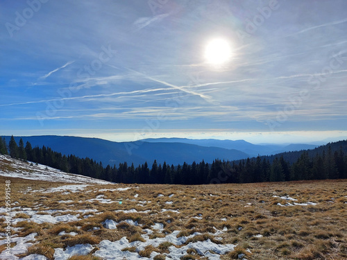 blue mountains in Slovenia. Bright sun. View form Pohorje mountains to horizon