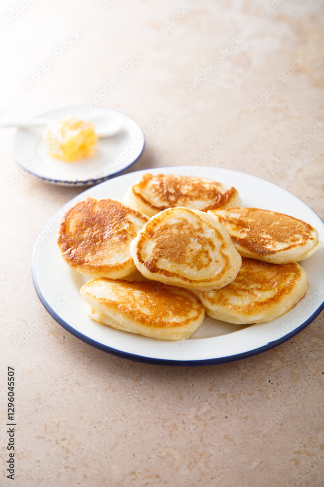 Homemade fluffy pancakes with honey Homemade fluffy pancakes with honey