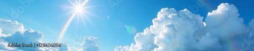 Bright sunny day featuring a striking blue sky filled with billowy clouds and a vivid rainbow, precipitation, scenic