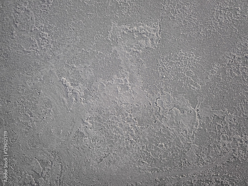 Prague, Czech republic - February 4, 2025: Dark gray concrete wall texture background showing rough surface in vysocany district