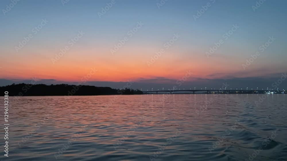 POV From Boat Sailing Across The River At Dusk In Vietnam. POV From Boat Sailing Across The River At Dusk In Vietnam.