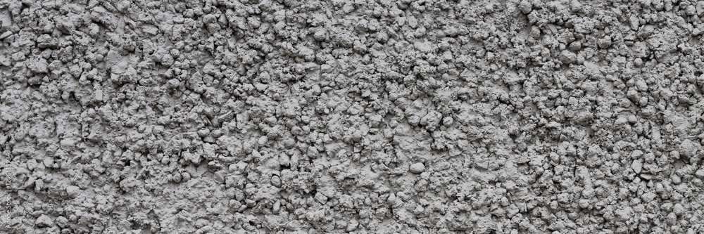 Fototapeta premium Painted plastered wall. Rough surface. Wall texture for background and design. Closeup.