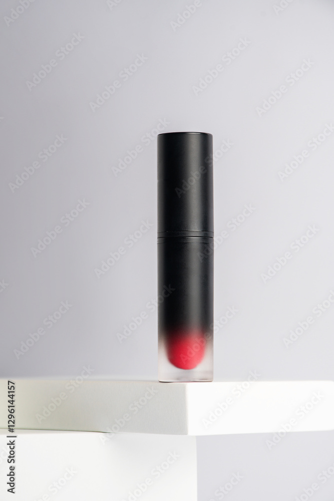 Fototapeta premium Mockup of black blank thin tube - mascara, lip gloss, gel, eyeliner, oil, etc. Cosmetic package with stylish props on white background. 