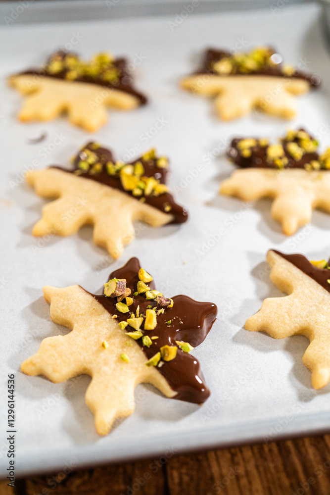 Making Holiday Star Cookies, Chocolate-Dipped with Pistachio Topping Making Holiday Star Cookies, Chocolate-Dipped with Pistachio Topping