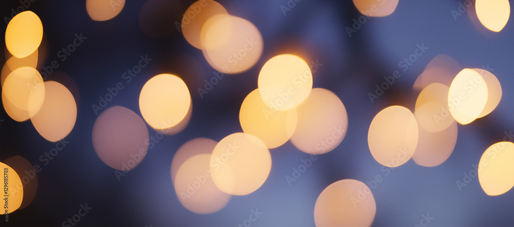 Obraz premium Sparkling Lights Bokeh: An artistic display of blurred, out-of-focus lights, creating a dreamy and atmospheric effect. These radiant orbs evoke warmth and a sense of enchantment.