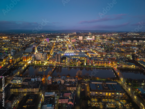 Night drone aerial drone illuminated downtown Glasgow city Scotland