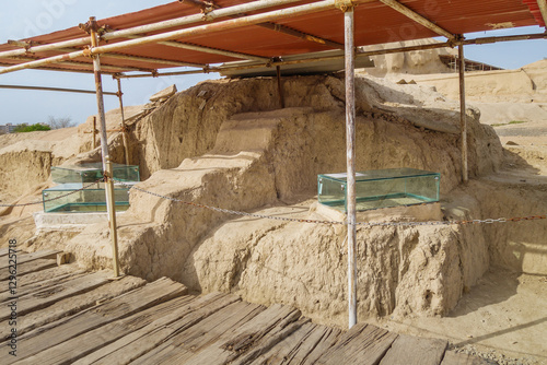 Excavations at Sialk Hill in Kashan, Iran. Part of ziggurat is visible behind the roof. The buildings date back to the 30th century BC. Local name of the site: Tepe Sialk photo