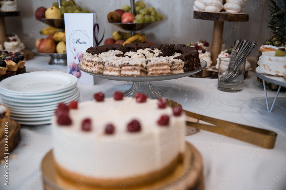 Naklejka premium Elegant Wedding Candy Bar with Colorful Sweets, Cakes, and Fruits