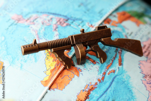 gun, weapon, shoot, war, map, world, globe, country, metal, theme, toy, attack, defense, offensive