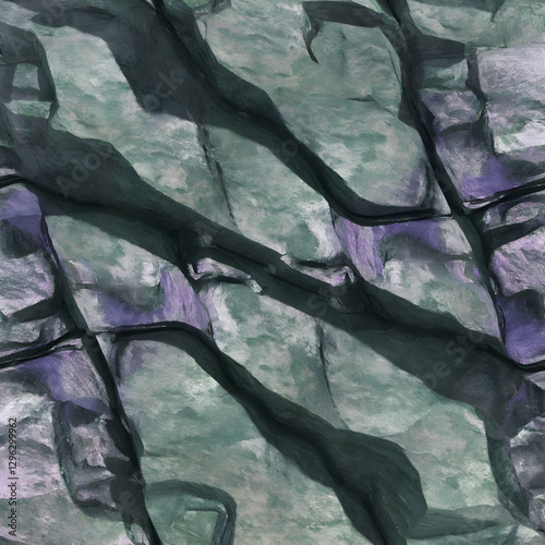 Green and purple rock surface revealing irregular shapes, crevices creating abstract geological pattern, ideal for textural design backgrounds photo