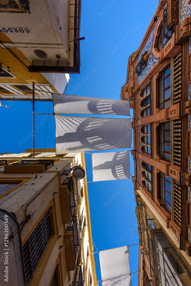 Seville, Spain - August 01, 2024: Walking the streets of the old town of Seville, Spain.