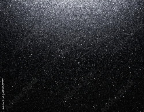 A shimmering black surface with a subtle sparkle effect, creating a dramatic and elegant ambiance.