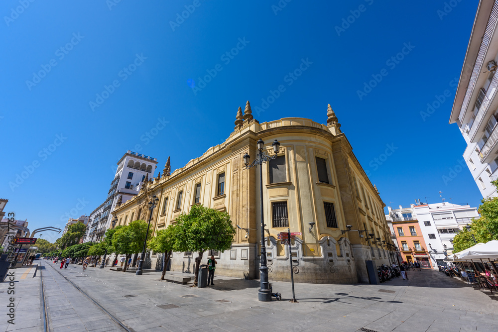 Seville, Spain - August 01, 2024: Walking the streets of the old town of Seville, Spain.
