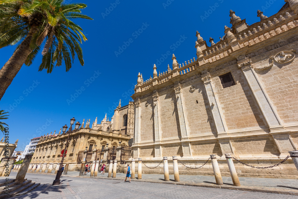 Seville, Spain - August 01, 2024: Sevilla Cathedral (Catedral de Santa Maria de la Sede), Gothic style architecture in Spain, Andalusia. Historic buildings and monuments of Seville, Spain.