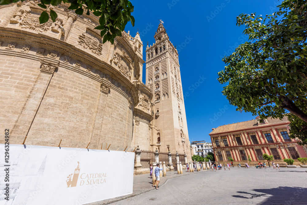 Seville, Spain - August 01, 2024: Sevilla Cathedral (Catedral de Santa Maria de la Sede), Gothic style architecture in Spain, Andalusia. Historic buildings and monuments of Seville, Spain.