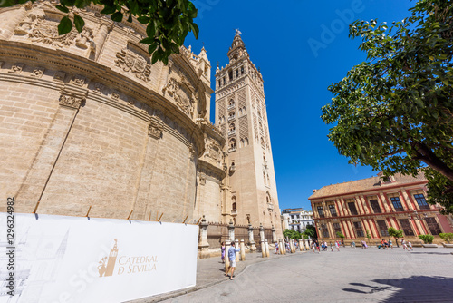 Obraz na płótnie Seville, Spain - August 01, 2024: Sevilla Cathedral (Catedral de Santa Maria de la Sede), Gothic style architecture in Spain, Andalusia. Historic buildings and monuments of Seville, Spain. w salonie