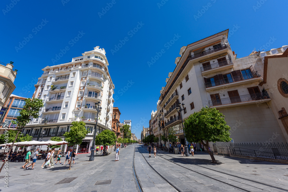 Seville, Spain - August 01, 2024: Walking the streets of the old town of Seville, Spain.