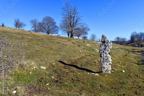 Menhir of Surbe in the Legaire meadows in the Sierra Entzia or Encia
