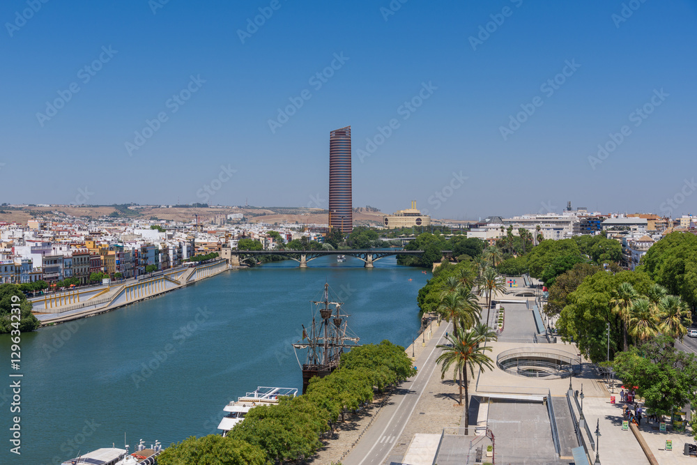 Seville, Spain - August 01, 2024: Guadalquivir river cityscape, Seville, Spain