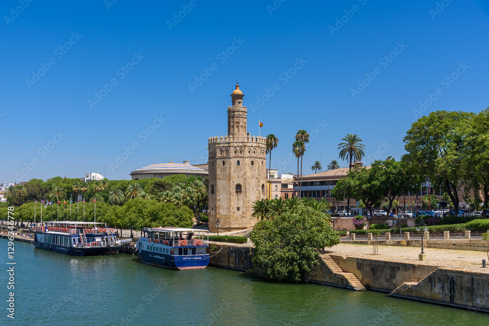 Seville, Spain - August 01, 2024: Torre del Oro Tower of Gold in Seville