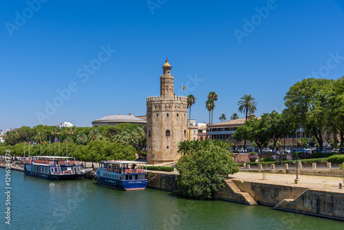 Obraz na płótnie Seville, Spain - August 01, 2024: Torre del Oro Tower of Gold in Seville w salonie
