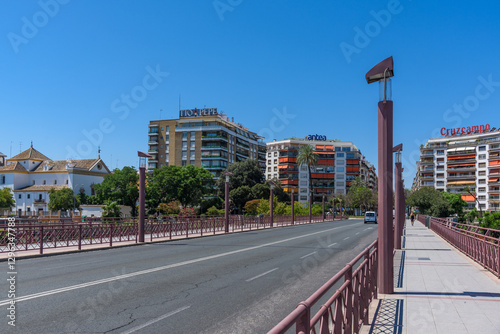 Obraz na płótnie Seville, Spain - August 01, 2024: Puente de Triana in Seville Spain w salonie
