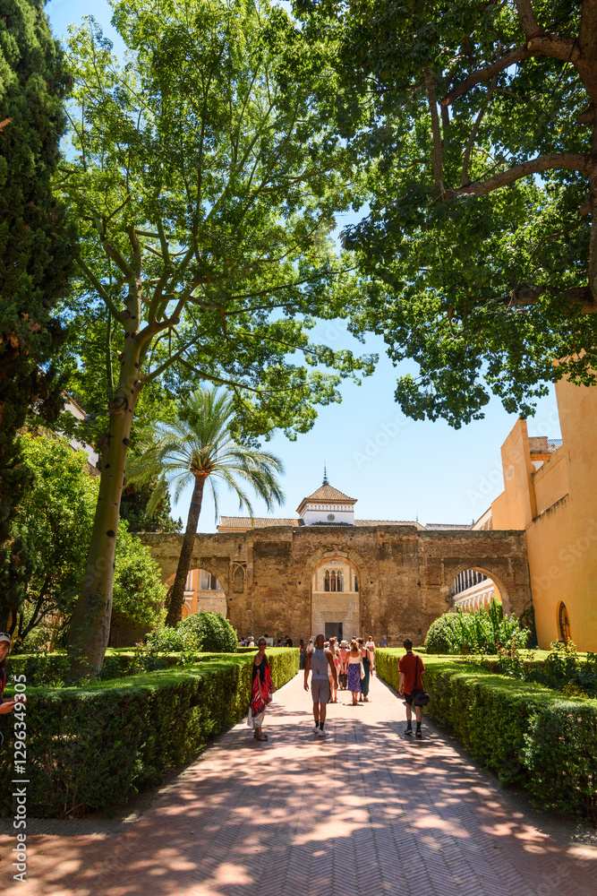Sevilla, Spain - August 01, 2024: Patio de las Doncellas in Royal palace, Real Alcazar (built in 1360) in Seville, Andalusia, Spain. The Alcázar of Seville, officially called Royal Alcázar of Seville,