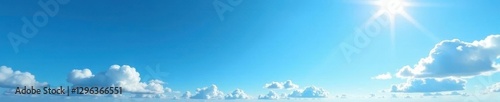Deep cobalt sky, scattered cirrus clouds, sunlit , perspective, high, freedom