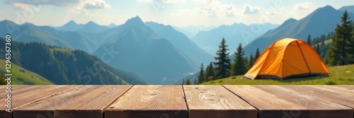 Empty wooden table with mountains and tent in background, clouds, texture