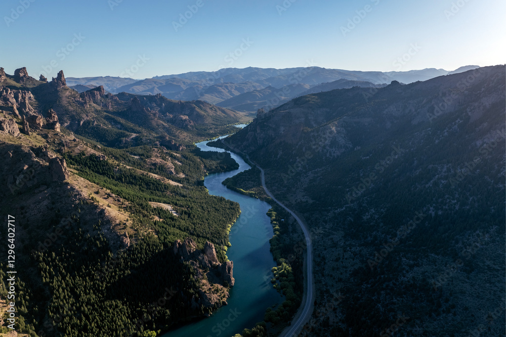 Amazing panoramic aerial view of Limay river surrounded by rock formations and mountains at sunset. Neuquen, Argentina Amazing panoramic aerial view of Limay river surrounded by rock formations and mountains at sunset. Neuquen, Argentina