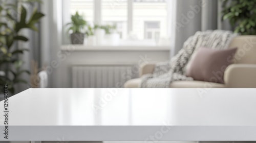 Bright white rectangular wooden table with soft even lighting and blurred modern living room background featuring armchair, throw blankets, and houseplants
