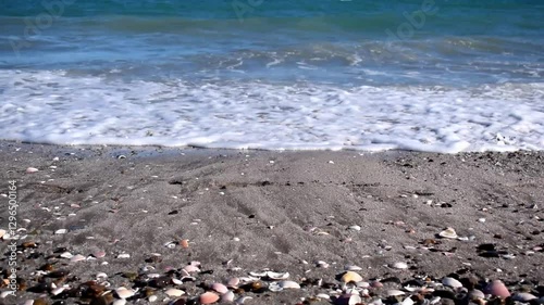 waves on the beach, water towards the camera.