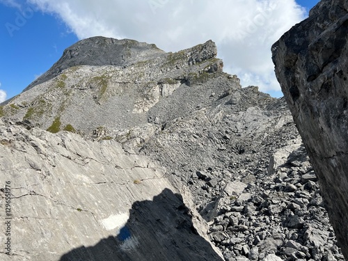 Alpine peak Barglen Schiben (2669 m) above the Tannensee lake (or Tannen lake) and in the Uri Alps mountain massif, Melchtal - Canton of Obwalden, Switzerland (Kanton Obwald, Schweiz) photo