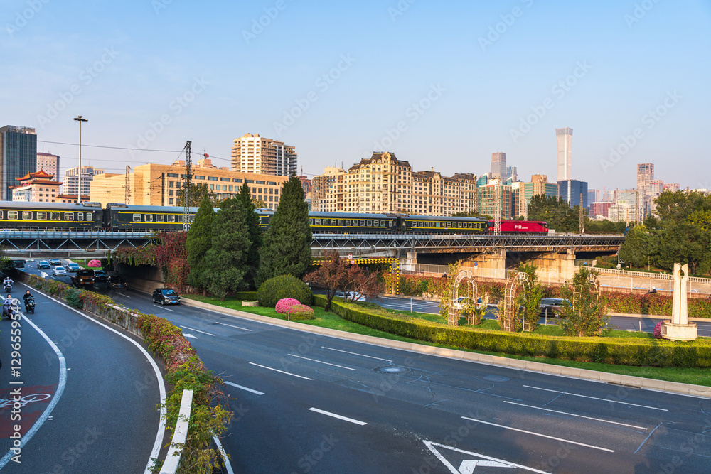 The scene of vehicles flowing continuously on the urban roads in Beijing, China The scene of vehicles flowing continuously on the urban roads in Beijing, China