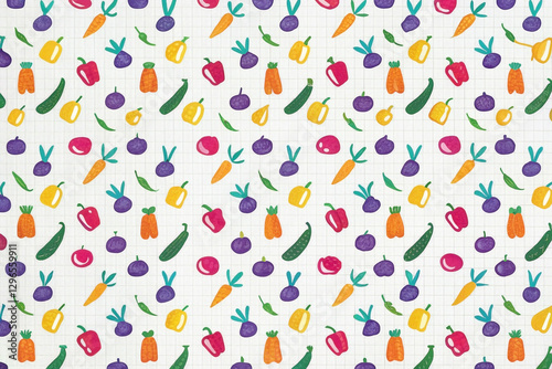 Colorful vegetable pattern on grid background.