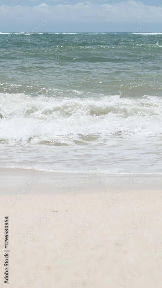BALI, INDONESIA - JANUARY 22, 2018: Clean sand of Pandava Beach and Indian Ocean waves, Bali. 4K BALI, INDONESIA - JANUARY 22, 2018: Clean sand of Pandava Beach and Indian Ocean waves, Bali. 4K