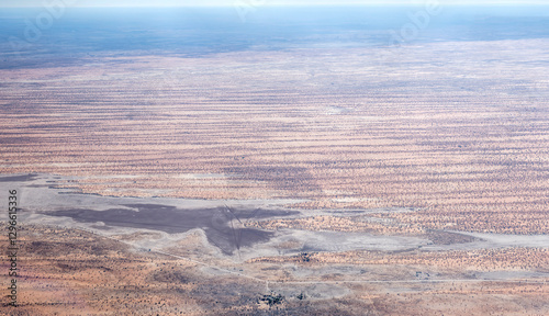 Obraz na płótnie stripes of red dunes and pan in Kalahari desert countryside, near Intu Afrika lodge, Namibia w salonie