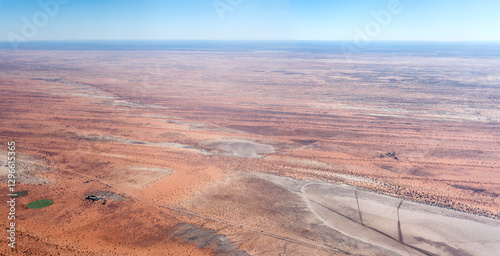 Obraz na płótnie large pan and farm with round fields in sand dunes at Kalahari desert countryside, Kalahari Auob Camp, Namibia w salonie